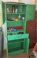 Green metal cabinet and contents