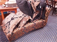 Chaise lounge with pillows and complementary
