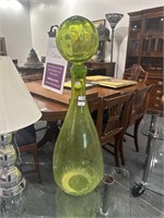 Large green art glass bottle