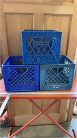 3 plastic milk crates