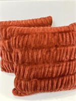 Pair of burgundy faux fur soft throw pillows