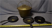 76B: (4) Cast-iron pots/pans,