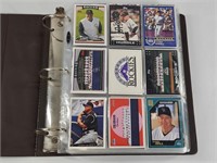 BINDER FULL OF ASSORTED BASEBALL CARDS