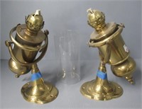 Pair of brass lanterns. Note one glass globe.