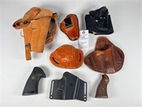 Six holsters and grips for revolvers