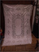 White cutwork tablecloth with lace trim