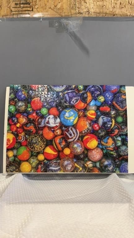 Glued puzzle picture of marbles.