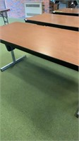 1 Wooden adjustable tables 72 inches x 30 inches