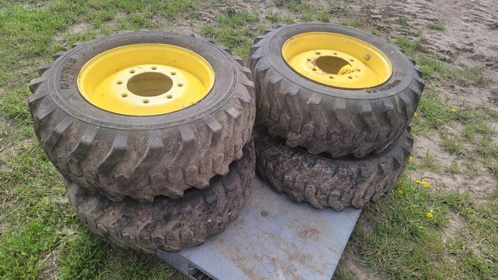 Set of 4 10-16.5 skidloader tires w/rims