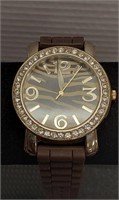 Geneva women's watch.  Rubber band. Needs battery