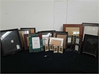 Large group of assorted photo frames some of them