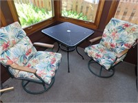 Patio table & 2 chairs w/cushions.