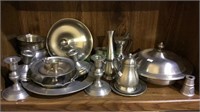 Shelf lot of about 22 pieces of pewter, Plates,