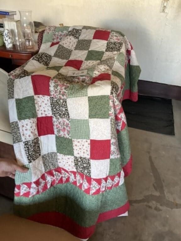 Red and green hand done quilt
And burgundy throw