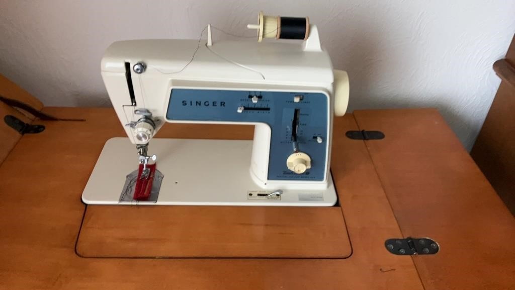 Singer Sewing Machine in Cabinet with Chair