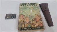 Boy scout handbook, silverware kit, and belt