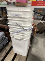 STACK OF SQUARE WHITE BUCKETS
