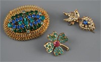 (3) Vintage brooches to include: Coro blue and