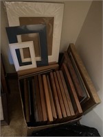 Large box of wooden picture frames