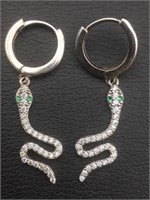 Sterling silver dangle snake earrings. Green