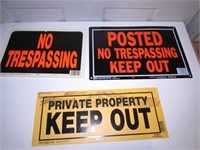 Three No Trespassing Signs, Largest is Metal