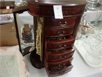 Free standing mahogany jewelry box with contents.
