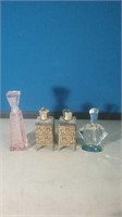 Group of four beautiful perfume bottles