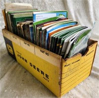 Box of Miniature Ertl John Deere Toy Catalogs