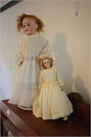 Two early porcelain dolls
