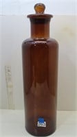 tall amber colored glass jar
