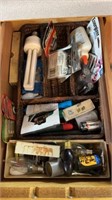 Junk drawer, glue, batteries, light bulbs, fuses,