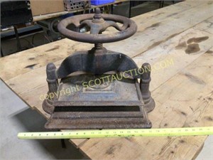 Vintage cast iron paper press, rusted