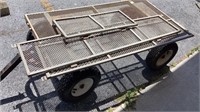 Metal Garden Wagon has 3 sides, 23x45"  bed