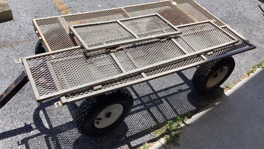 Metal Garden Wagon has 3 sides, 23x45"  bed