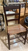 Vintage ladder back chair with cane seat   1915