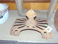 cast iron stove top with finial