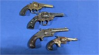 4 antique revolver handguns.  note: not in w