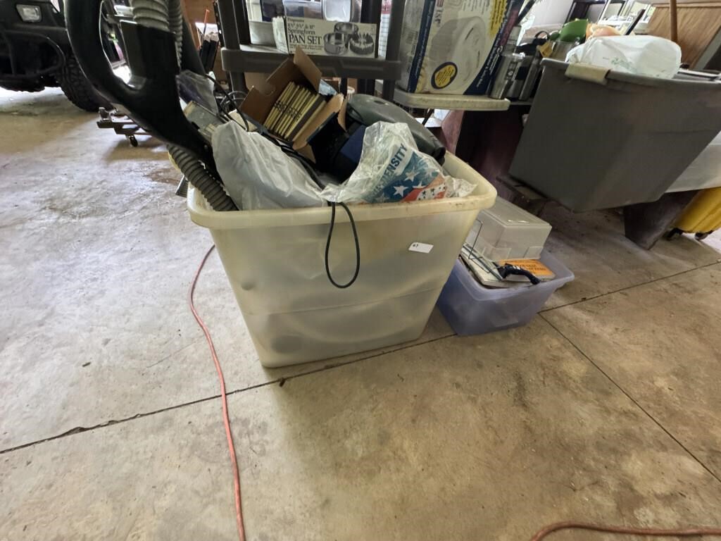 TWO TOTES WITH VACUUM. PARTS AND MISC.