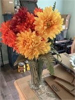 Fake flowers and vase, hello sunshine sign, glass