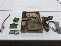 assortment of ARMY straps, bags, tool holders
