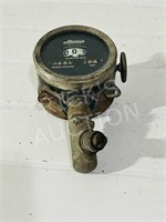 antique Stewart magnetic style speedometer