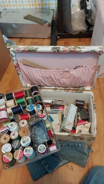 Sewing box loaded with goods