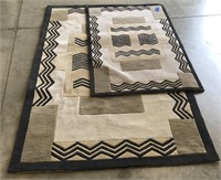 (D) Lot of 2 Rugs Measuring aprox 66” by 43” and