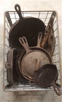 Old Milk Crate Full of Cast Iron Cookware