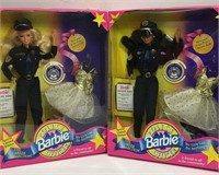 Group Of 2 Police Officer Barbies In Boxes