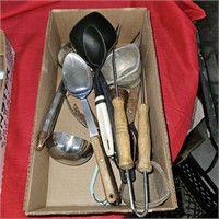 box of kitchen utensils