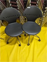 (2) Rolling Plastic Chairs