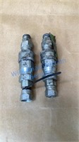 TWO HYDRAULIC COUPLERS