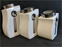 3 Kitchen Canisters 7", 8" and 9" with spoons