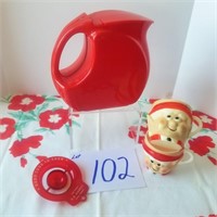 Red plastic pitcher, egg seperator
